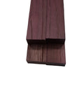 Wooden block with a purple-brown finish on a white background